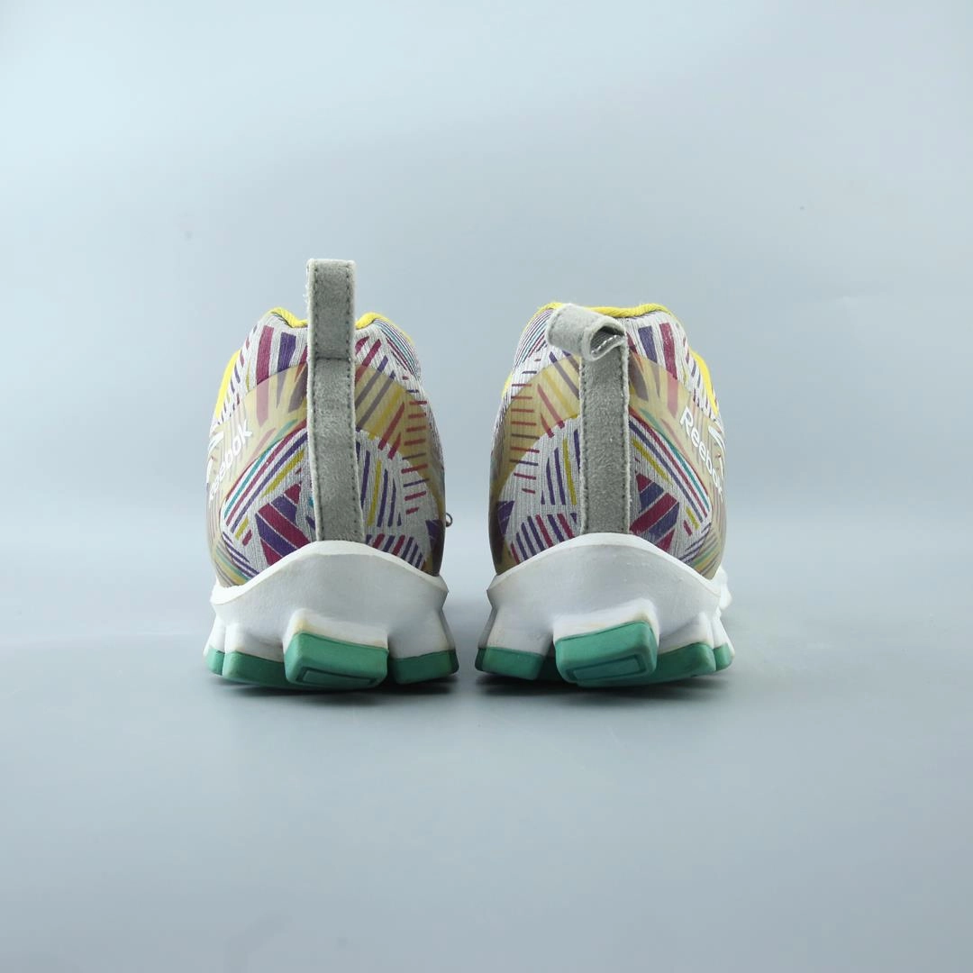 REEBOK REALFLEX Reebok athletic footwear visuals