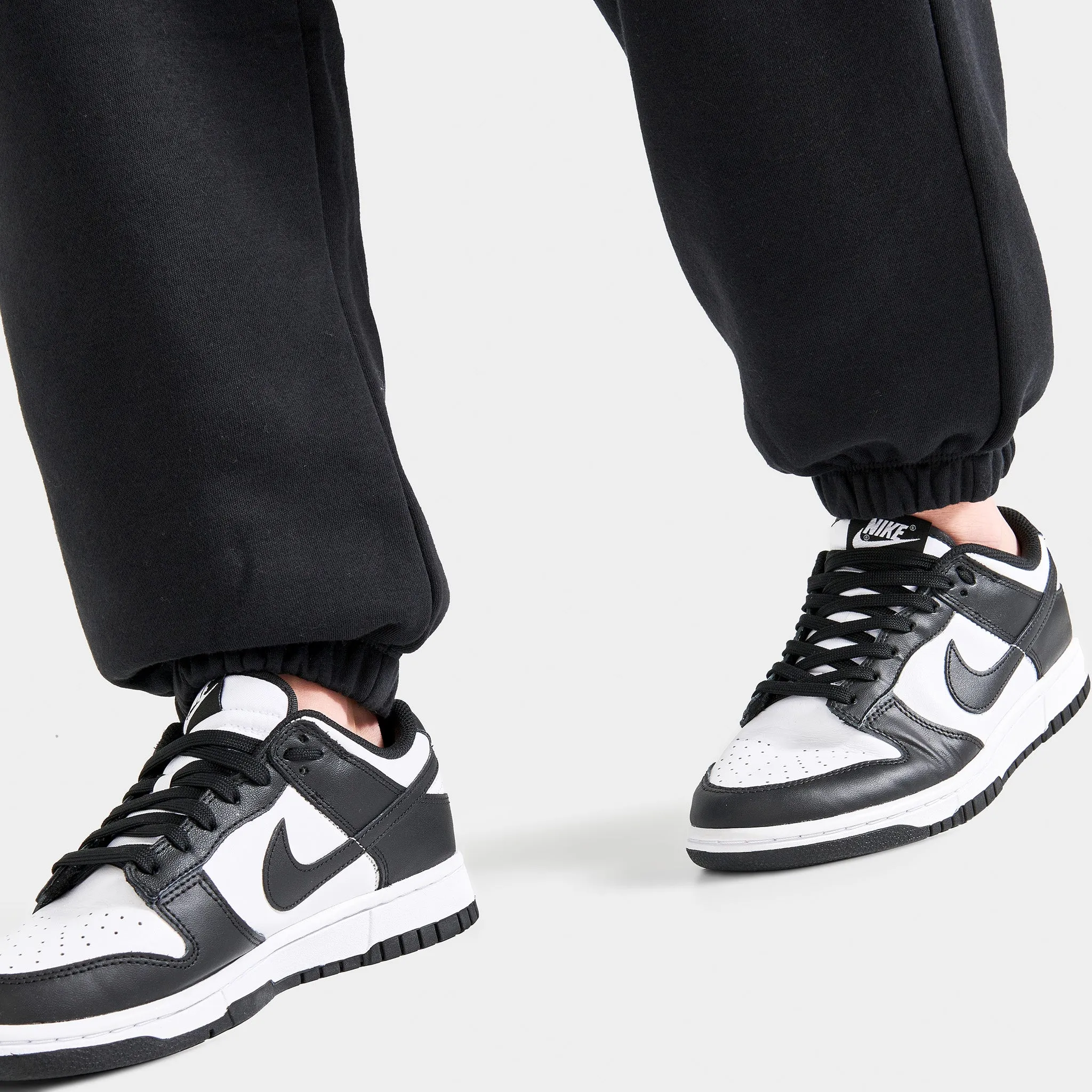 Womens Nike Nike Sportswear Women's Club Fleece Mid-Rise Oversized Sweatpants Black / White